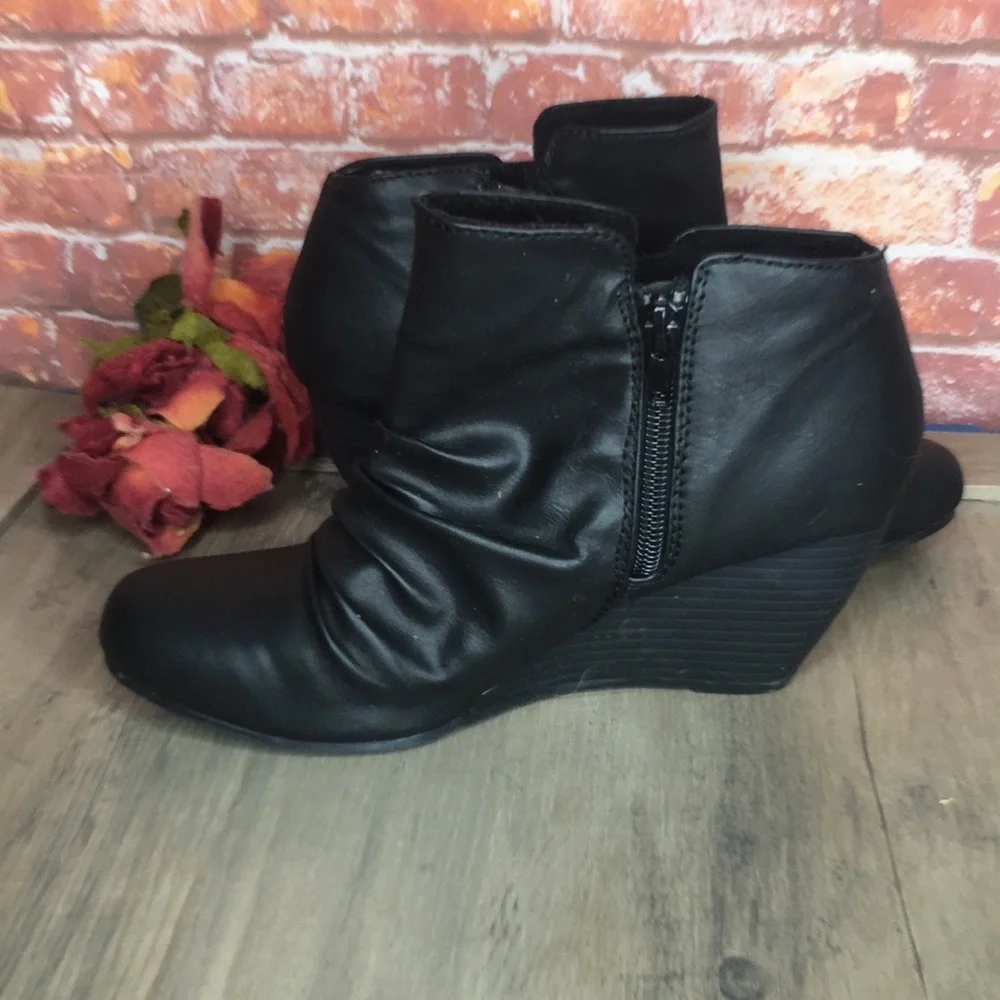 Blowfish’s Malibu Black Slouchy Faux Leather Wedge Ankle Booties